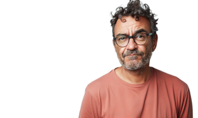 Portrait of a middle-aged man dressed in casual clothes with glasses looking for the camera.