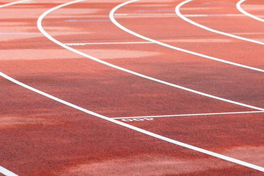 modern running track in a stadium with 400 meters distance markings