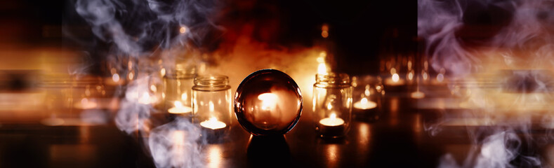 Abstract background with smoke ball and candles. Prediction of the future. Divination.