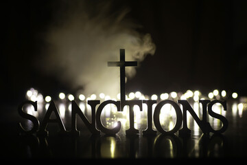 Word Sanctions made of wooden block letters with dramatic lighting and smoke - obrazy, fototapety, plakaty