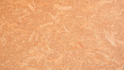 OSB oriented strand wooden board background. Seamless compressed wood particle board texture...