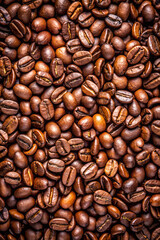 Obraz premium High-quality, oily coffee beans, ideal for coffee connoisseur, background