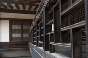 The wooden guardrail in the traditional Korean building