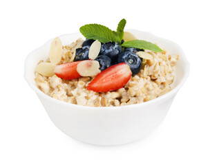 Tasty oatmeal with strawberries, blueberries and almond flakes in bowl isolated on white