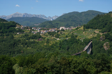Summer landscape along the road from Castelnuovo Garfagnana to San Romano, Tuscany - 789218947