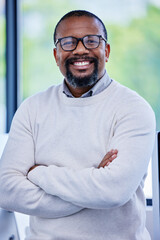 Arms crossed, portrait and smile of business black man in office management with ambition or...