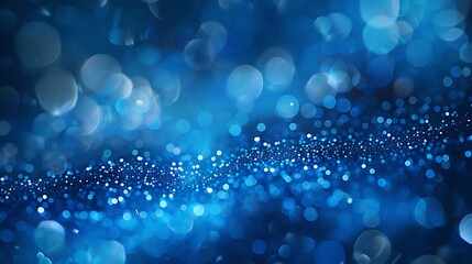 Abstract blue circular particles bokeh background