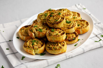Homemade Chicken Pesto Pinwheels on a Plate, side view. - 789225127