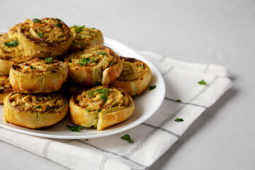 Homemade Chicken Pesto Pinwheels on a Plate, low angle view. Close-up. - 789225513