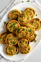 Homemade Chicken Pesto Pinwheels on a Plate, top view. Flat lay, overhead, from above. - 789225577