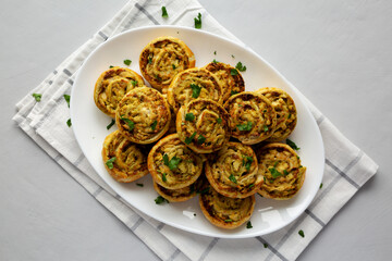 Homemade Chicken Pesto Pinwheels on a Plate, top view. Flat lay, overhead, from above. - 789225579