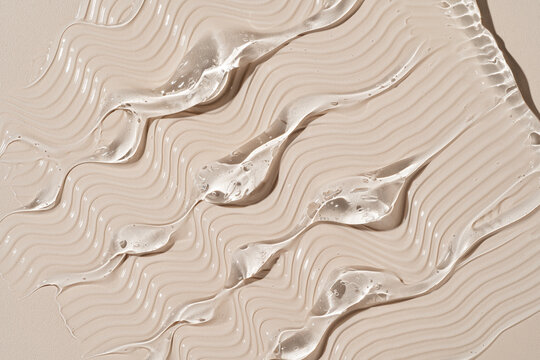 Abstract Swirled Gel Texture on a Neutral Background