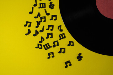 Vynil , music, notes on yellow background. Music day. Jazz day