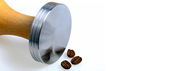 three roasted Arabica beans reflected in the cold steel of a tamper, advertising brochure, white background, copy space
