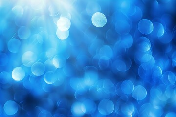 Abstract blue bokeh lights background with blurred defocused effect for artistic designs