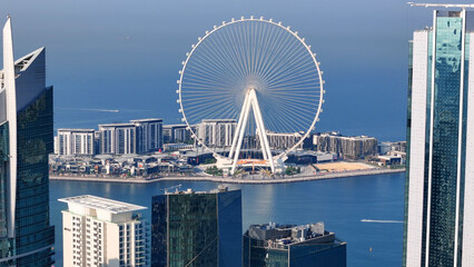 Aerial view of Dubai Marina. Dubai Marina is an affluent residential neighborhood known for The...
