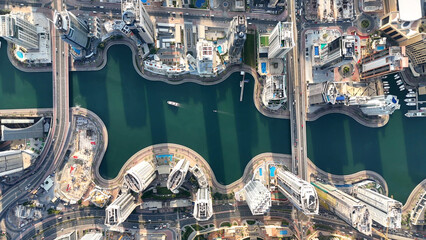 Aerial view of Dubai Marina. Dubai Marina is an affluent residential neighborhood known for The Beach at JBR.	 - 789246591