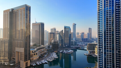 Aerial view of Dubai Marina. Dubai Marina is an affluent residential neighborhood known for The Beach at JBR.	 - 789246599