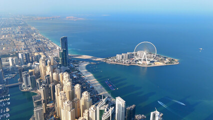 Aerial view of Dubai Marina. Dubai Marina is an affluent residential neighborhood known for The Beach at JBR.	 - 789246703