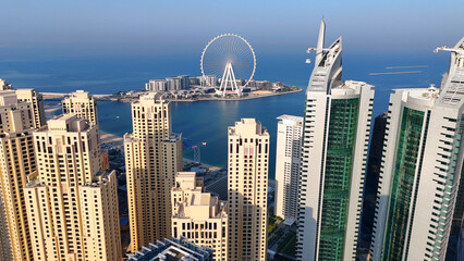 Aerial view of Dubai Marina. Dubai Marina is an affluent residential neighborhood known for The Beach at JBR.	 - 789246730