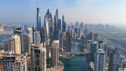 Aerial view of Dubai Marina. Dubai Marina is an affluent residential neighborhood known for The Beach at JBR.	 - 789246767