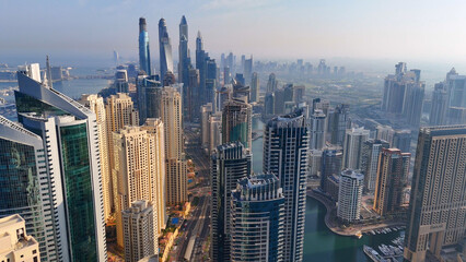 Aerial view of Dubai Marina. Dubai Marina is an affluent residential neighborhood known for The Beach at JBR.	 - 789246768