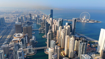 Aerial view of Dubai Marina. Dubai Marina is an affluent residential neighborhood known for The Beach at JBR.	 - 789246923