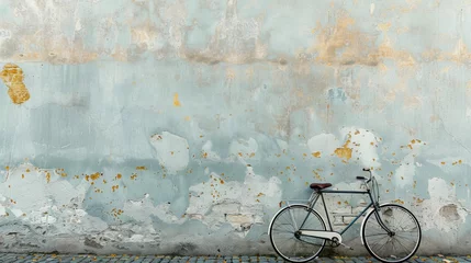 Afwasbaar behang Fiets Vintage bicycle parked next to a weathered wall with peeling paint.