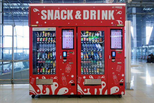 Self-service Snack and drink vending machine or kiosk in terminal of Suvarnabhumi Airport, one of two international airports serving Bangkok, one-stop solution kiosk