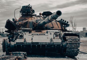 damaged military tank on a city street in Ukraine