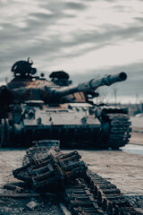 damaged military tank on a city street in Ukraine