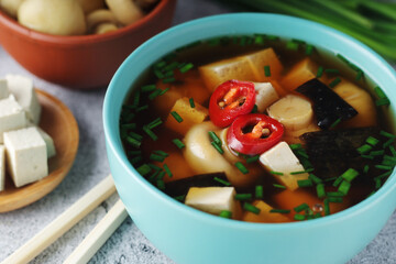 A bowl with miso soup, traditional Japanese dish