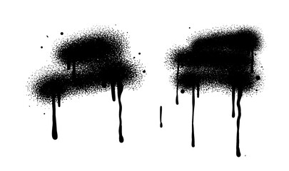 Black color spray paint or graffiti design element on the white wall background.	