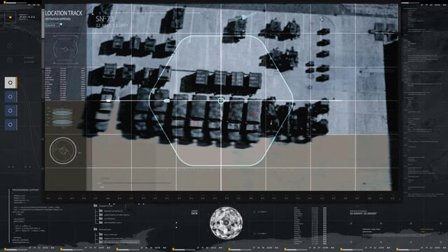 Spying tracking system showing the satellite camera feed. Spying tracking locating multiple army vehicles on a military base using a satellite. Spying tracking system analyzing cars using a satellite.