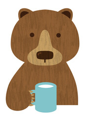 マグカップで飲み物を飲む熊