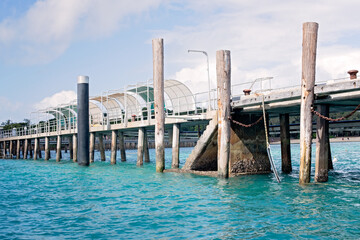 arrival jetty pier, Green Island Queensland, tropical blue water, travel family holiday vacation...