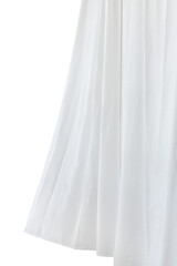 White drapery hanging from a curtain rod design element