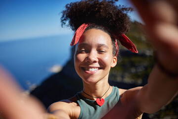 Mountain, travel and woman with smile in selfie for vacation memory, adventure or hiking update....