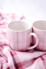 Mugs with tartan patterns, pink christmas сreated with Generative Ai