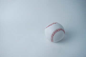 White and red colored baseball sport ball object photography isolated on horizontal white studio...