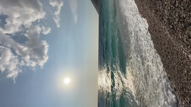 Rocky beach and crystal turquoise water of Ionian Sea in Albania