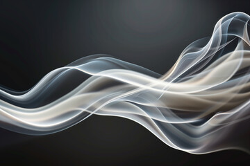 Beautiful and elegant wisp of white smoke on a black background