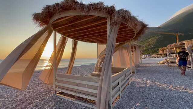 White beach canopies. Luxury beach tents at a resort.