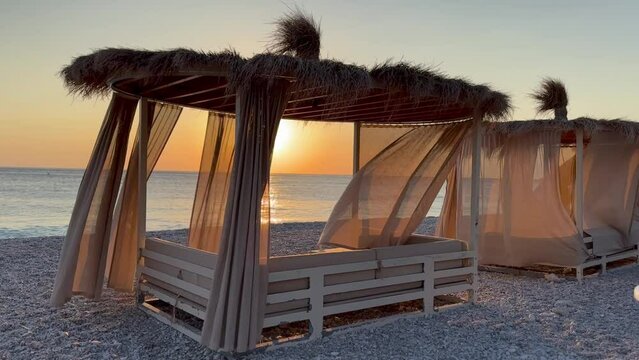 White beach canopies. Luxury beach tents at a resort.