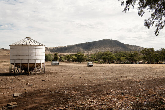 Water tank and feed bins in a dry paddock