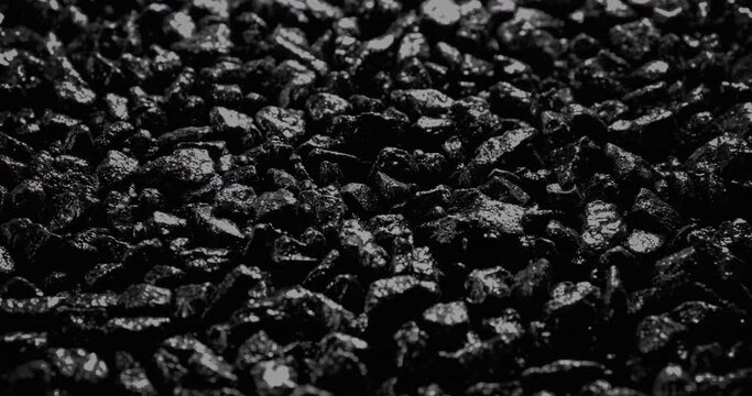 Black stones. Abstract background. Black sand grunge background. Сlose-up.