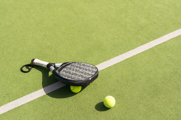 paddle tennis racket, ball. close- up on the racket - 789375361