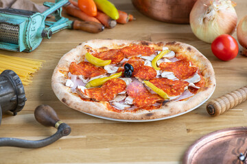 pizza with salami and tomatoes