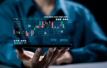 Trader use smartphone to analyzing growing stock on virtual screen for invest in trading. planning...