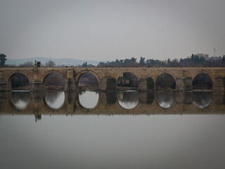 an ancient Roman bridge over Guadalquivir river in Cordoba Spain © Abdul Rahman